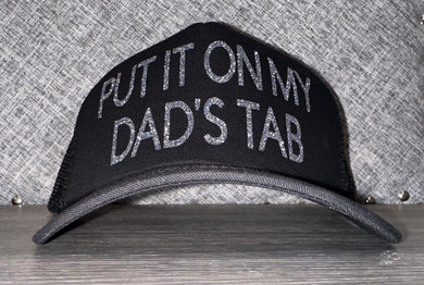 Put It On My Dad’s Tab Trucker Hat