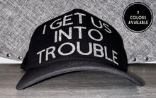 Load image into Gallery viewer, I Get Us Into Trouble Trucker Hat